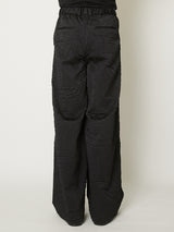TEXTURED SHRINKAGE TROUSERS