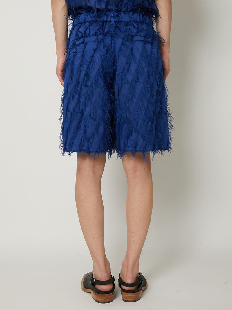 FRINGE CUT ABOVE-THE KNEE SHORTS