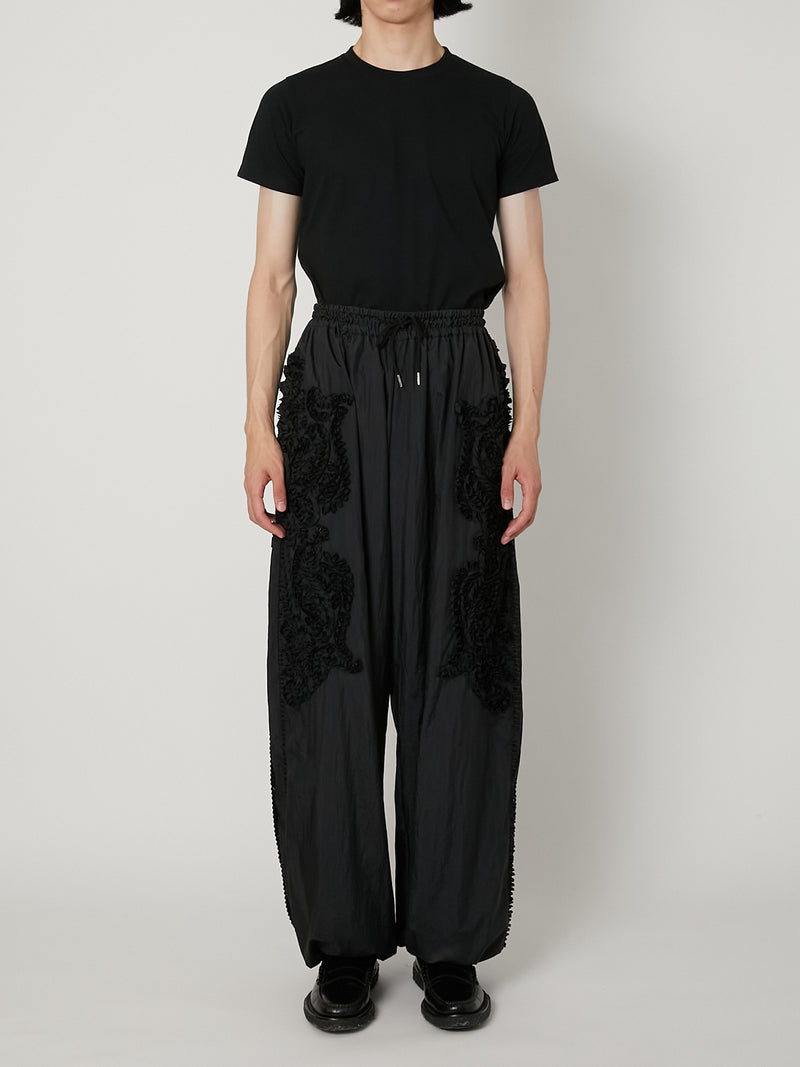 SCULPTURAL EMBROIDERY TRACK PANTS – TAAKK