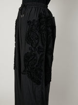 SCULPTURAL EMBROIDERY TRACK PANTS