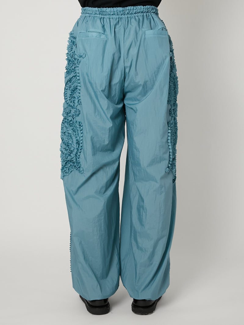 ワークパンツ/カーゴパンツ Track Nylon Pants Embroidery SCULPTURAL EMBROIDERY TRACK PANTS – TAAKK