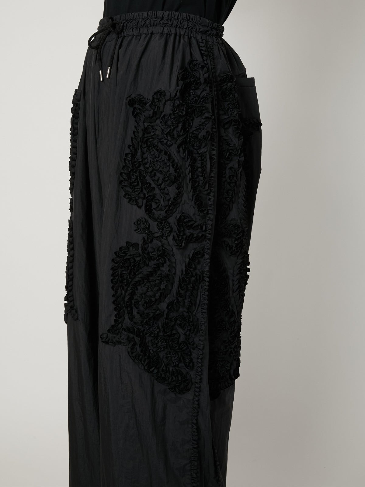SCULPTURAL EMBROIDERY TRACK PANTS – TAAKK