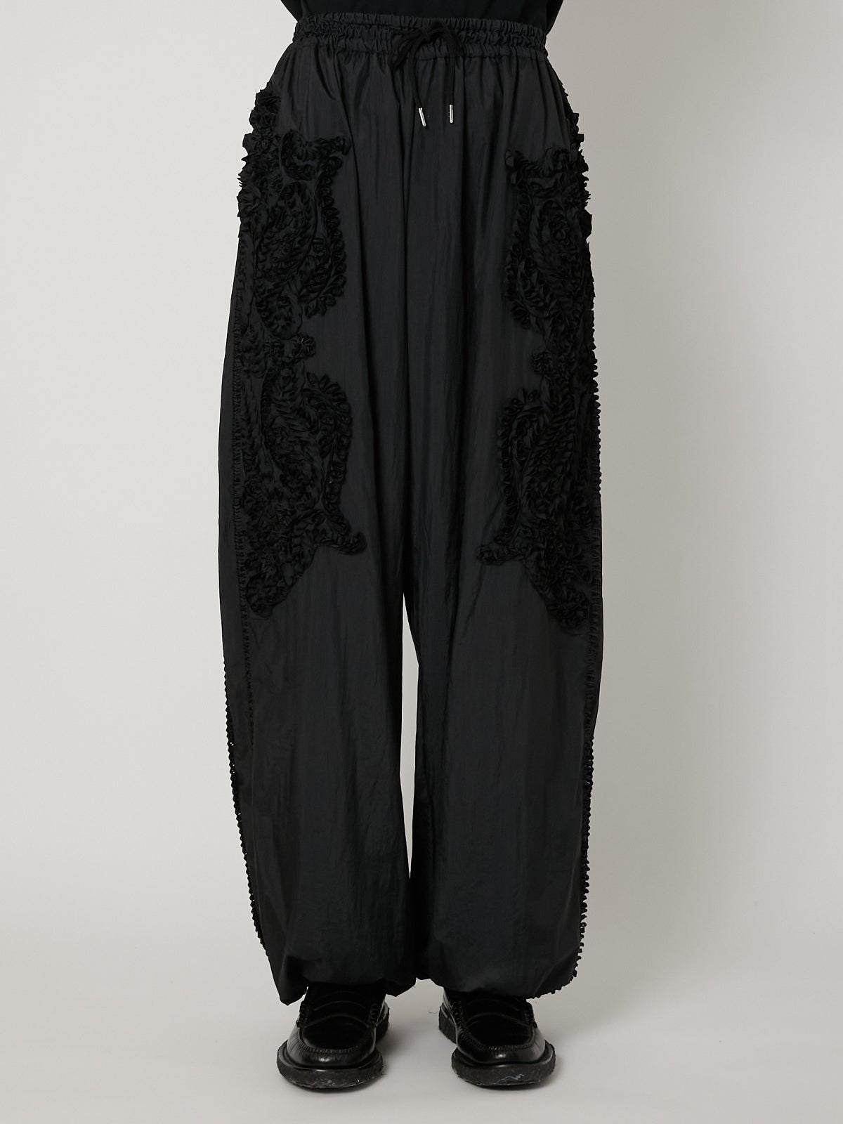 SCULPTURAL EMBROIDERY TRACK PANTS – TAAKK